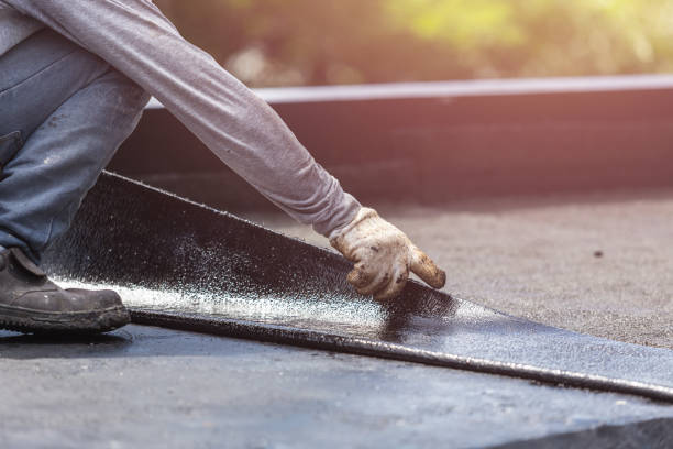 Professional Basement Waterproofing technician working in Saint John, IN
